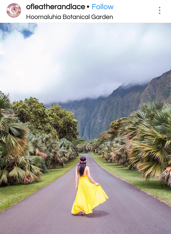 Woman Standing in Street of Hoomaluhia Botanical Gardens